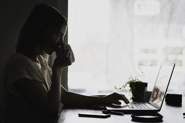 freelancer workspace laptop coffee ai