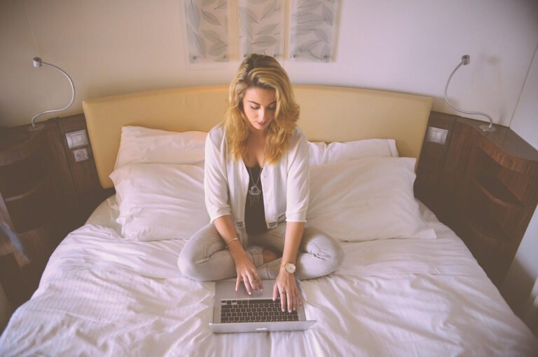 person using laptop with ai assistant interface