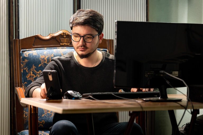person using laptop with ai assistant interface