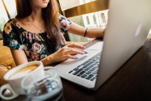 freelancer workspace laptop coffee ai
