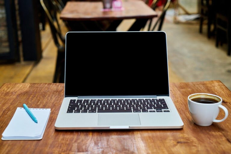 freelancer workspace laptop coffee ai